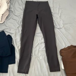 Dark gray lululemon leggings (I think wunder trains)